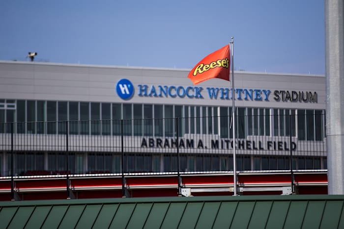 Jan 26, 2021; Mobile, Alabama, USA; Reese s flags fly above Hancock Whitney Stadium for Senior Bowl week. The first day s practices were moved indoors with no media access due to weather concerns.